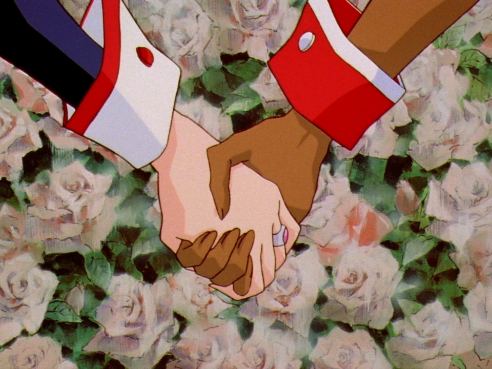 Anthy and Utena holding hands
