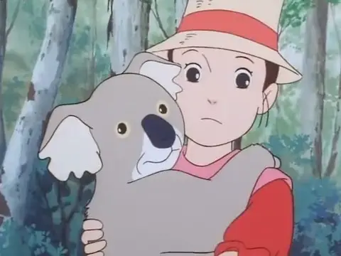 Lucy hugs a Koala